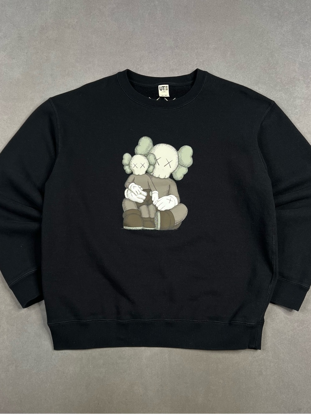 Kaws Uniqlo Black Crewneck Sweater with Character Graphic